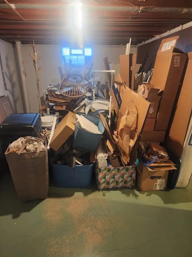 Roll-off dumpster container at job site for 15 Yard Dumpster Rental in Covington